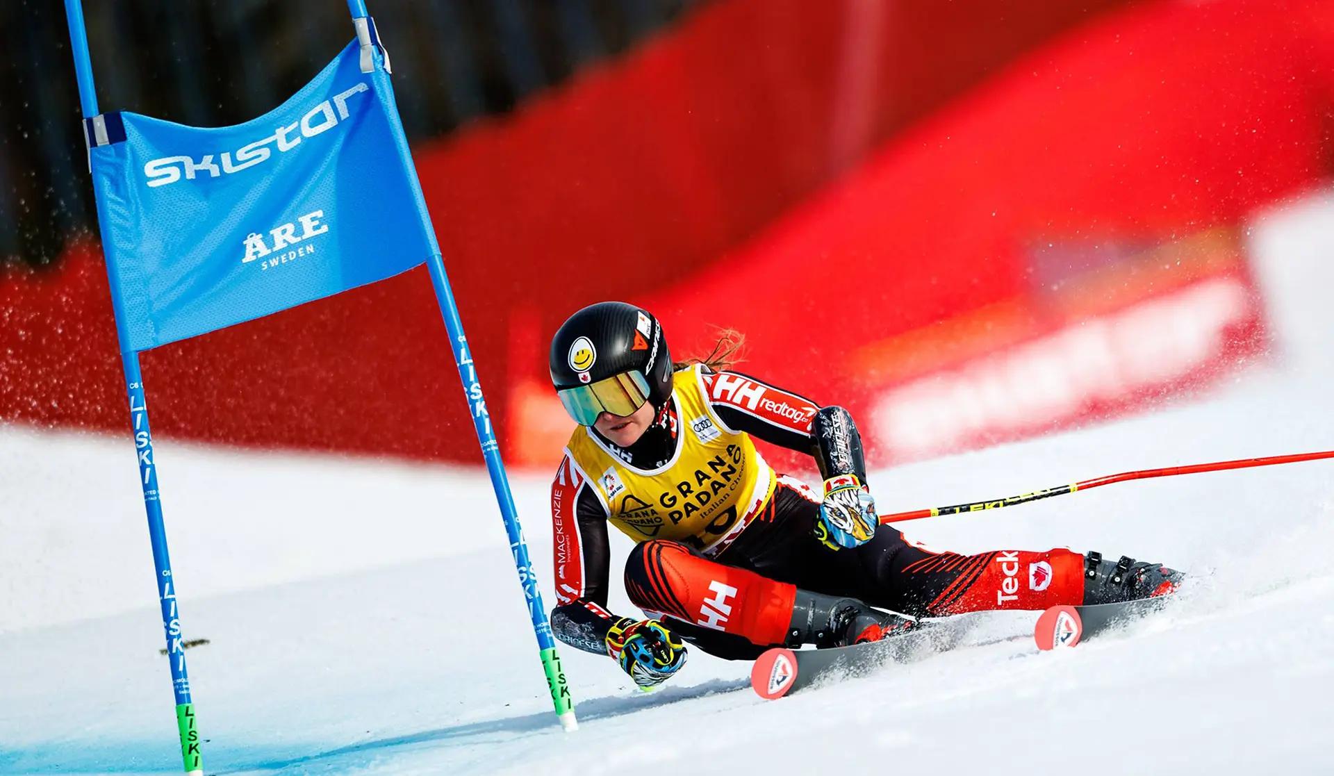 Action shot of Valérie Grenier taking a sharp turn during a race